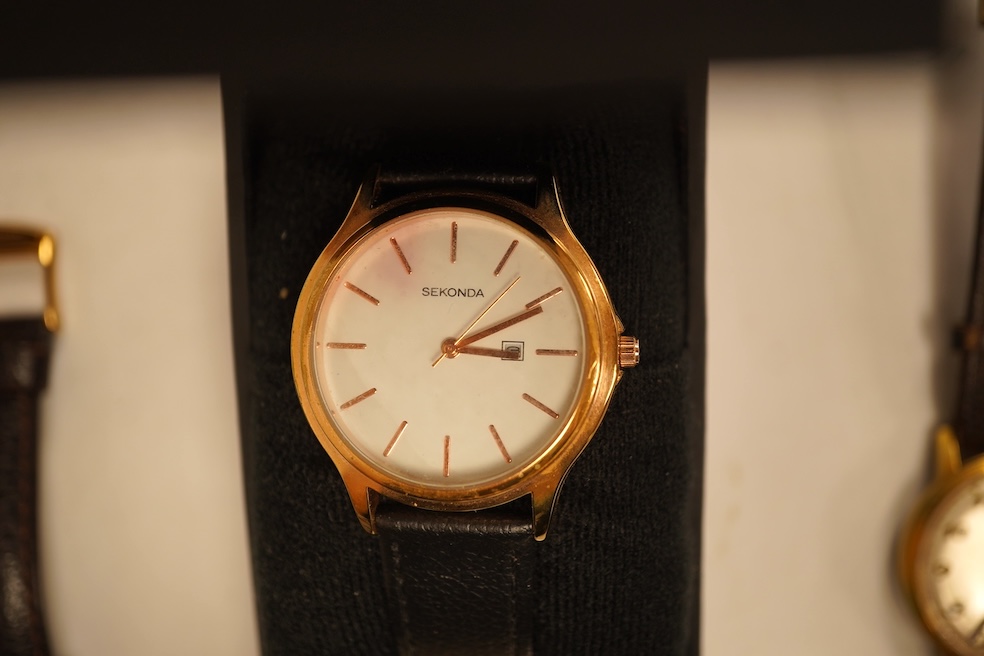 A large Nixon SI-30 stainless steel gentleman's chronograph wristwatch and nine various quartz wristwatches including Seiko.